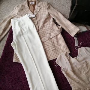 Beautiful size 12 suit and pants by LE suit